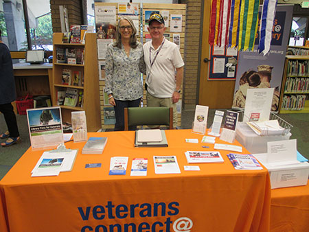 Evelyn Figeroid, Branch Veteran Resource Station Coordinator and Bill Mattingly, volunteer and Vietnam veteran.
