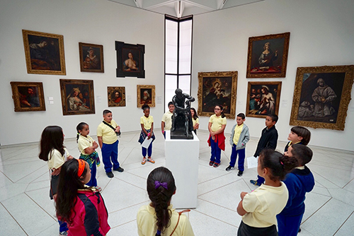 Elementary School children touring a gallery at Medalist Museo de Arte de Ponce.