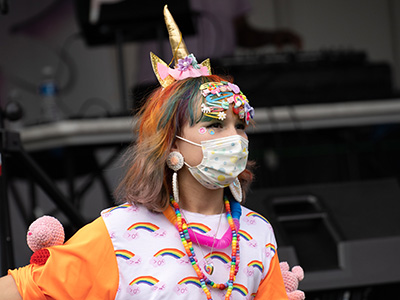 girl at Chicago Public Library breaking barriers in style event with unicorn horn and rainbow clothes