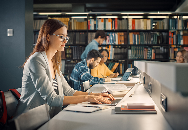 Woman doing research in library