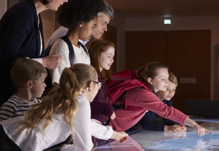 Students at interactive museum display