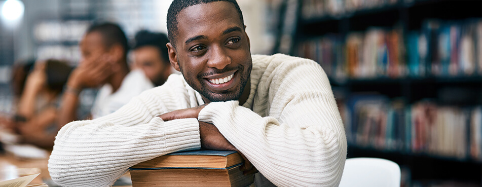 Black student in a university library