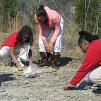 Students on a Learning Expedition at the Chattanooga Nature Center dig for fossils