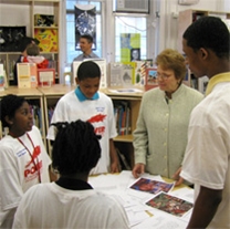 Anne-Imelda Radice, IMLS Director, with students from the Stuart-Hobson Middle School.