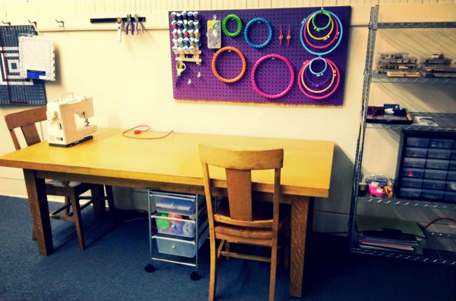 makerspace with work table, sewing machine and supplies