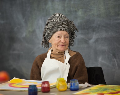 A woman participates in an art-making class at the Frye Art Museum as part of the Creative Aging program